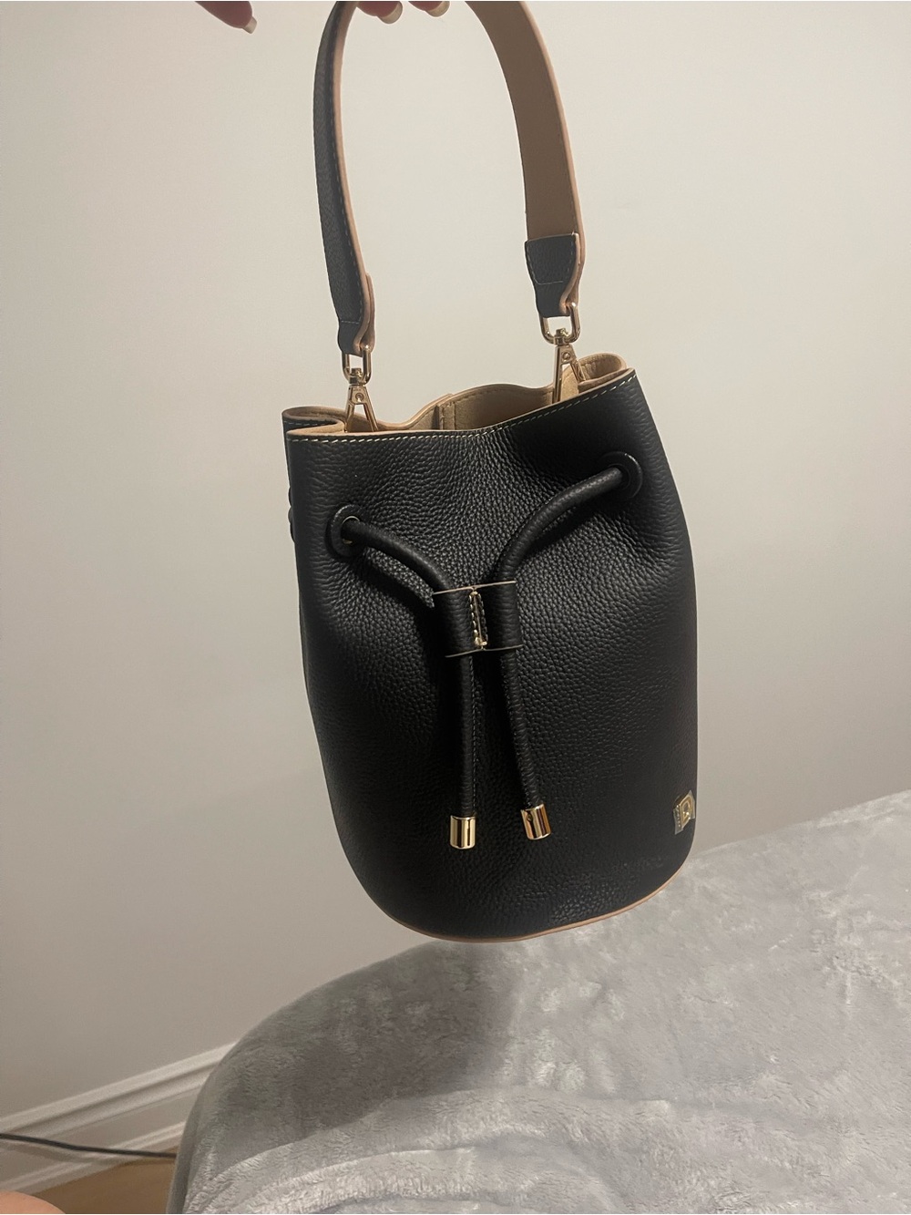 Danier Black Pebbled Leather Mini Bucket Bag with Tan Handle